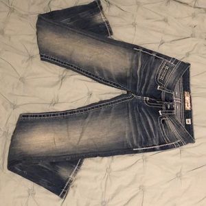 Women’s buckle jeans
